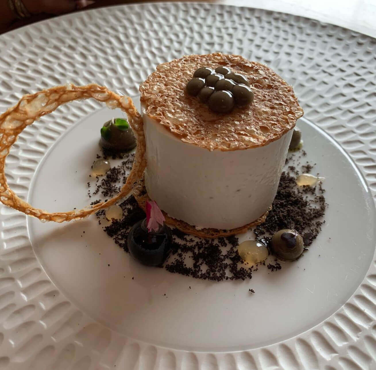 Receta de Coulant de queso manchego, aceituna cacereña y tortita de oreja de cerdo