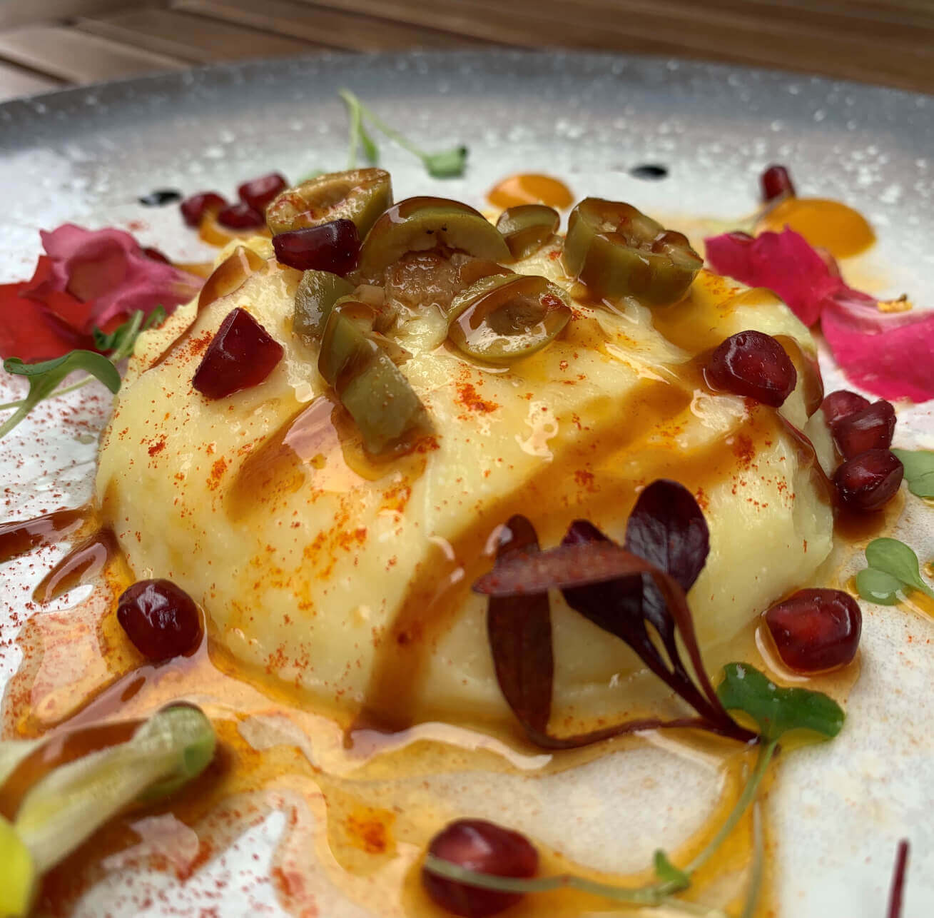 Receta de muselina de bacalao, aceituna Gordal y vinagreta de mango